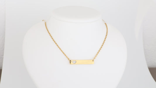 Stainless steel bar with cut out heart pendant with necklace